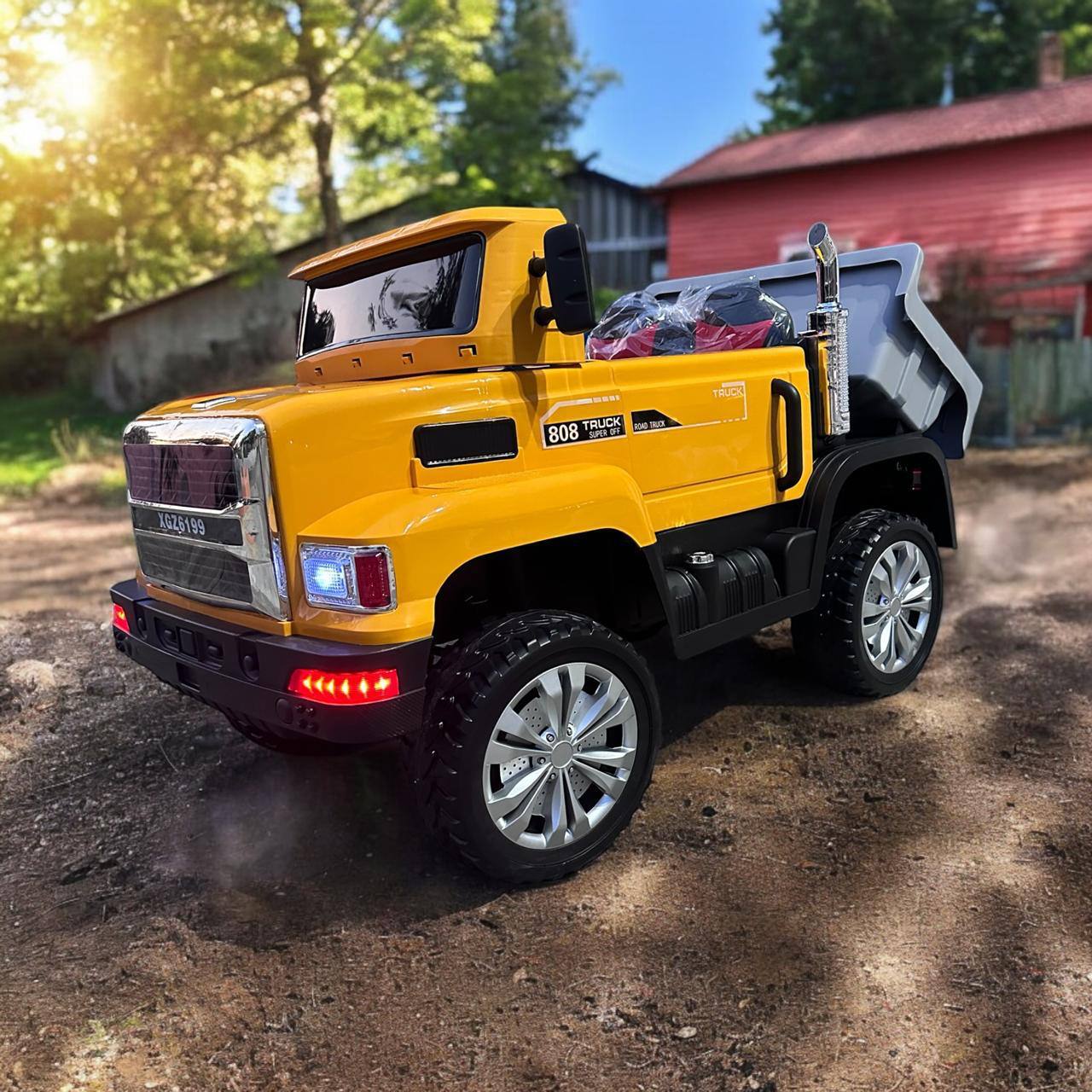 Carro Eléctrico Montable Camión Con Volcó Ll/Goma C/Remoto 1 a 7 Años